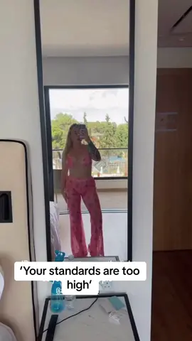 Holding the lamp out the way of the mirror for me😂🥹 