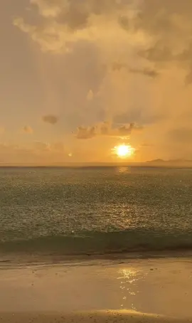Amazing feeling to stand on the beach at sunset while raining, and the rain poured heavier and stronger, then suddenly stopped, and a rainbow appeared behind us 🫶🌦️🌈 #calaguasisland #calaguasadventure #beach #camrinesnorte #sunset #waves #bucketlist #DIYTravel #traveldiaries 