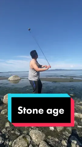 Stone age Slinging rocks at lake #sling #slinging #slinger #davidvsgoliath #lake #longdistance #flightarchery #range #plinking #balearic #seattle #washington #stoneage