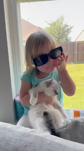 What it's like trying to take pictures of a toddler with sunglasses on