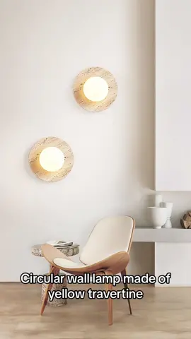 Circular wall lamp made of yellow travertine, extremely sleek yet highly textured. Suitable for use in living rooms, dining areas, kitchens, study rooms, bedrooms, bathrooms, and other spaces.#indoorlighting #wabisabi #walllight #homeimprovement 