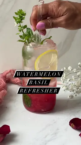 Watermelon Basil Refresher Cook time: 5 minutes  Serves: 1 I just cut down my basil plant and decided to do something different than pesto. This is a really refreshing combination especially on a hot summer day. It will be great for a July 4th  get together. Do give it a try! ½ cup watermelon 1 tbsp fresh basil leaves ½ lemon juiced 1-2 tsp sugar (if desired) ½ cup club soda ½ cup ice Add watermelon, basil, lemon juice and sugar to a glass. Use a fruit masher to mash all the ingredients together. Add ice. Fill the cup with club soda. #drinkrecipe #summerdrink #watermelonrecipes #basil #EasyRecipe #mocktails 