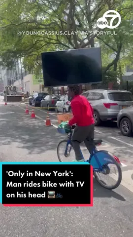 Can't believe his eyes 🚲️📺️ A man had to confirm he wasn’t seeing things after spotting a cyclist balancing a TV on their head in New York. #abc7la #news #abc7eyewitness #bike #TV #newyork 