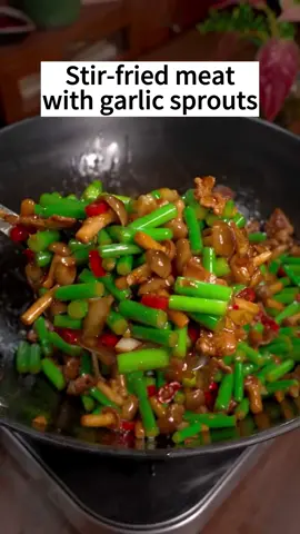 This garlic scapes stir-fry recipe is best if made early in the late spring/early summer season, when the scapes are at their most tender.#stirfriedpork #garlicsprout #tiktokfood #EasyRecipe