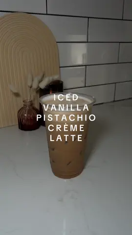 iced vanilla pistachio crème latte using @elmhurst1925 creamer💚 #asmr #icedlatterecipe #coffeeathome #latteathome #starbucksathome #icedlatte #nespressotalents #nespressovertuo #nespressopods #nespresso #icedpistachiolatte #icedoatmilklatte 