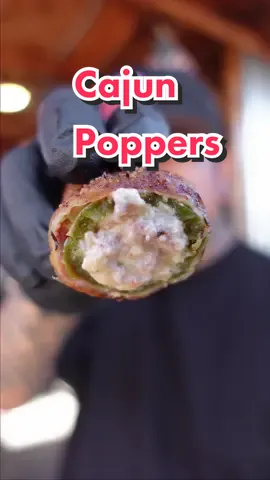 Cajun Poppers ⚜️: Recipe Below👇🏾 To me shrimp and andouille sausage just screams Cajun. It’s something my mother use to incorporate into a bunch of dishes. So adding that into a bacon wrapped jalapeño popper w/ cheese?! These were 💰AF _______________________________________ 𝙄𝙣𝙜𝙧𝙚𝙙𝙞𝙚𝙣𝙩𝙨: • A dozen or so Shrimp • 2 Andouille sausage links • @Tony Chachere More Spice & No Salt • 2 Block of Cream Cheese • 1 cup Shredded Mexican Cheese • Around 2 dozen Jalapeños • 1 pack Bacon 𝙄𝙣𝙨𝙩𝙧𝙪𝙘𝙩𝙞𝙤𝙣𝙨: • Olive or as a binder for shrimp then season heavily w/ @tonychacheres More Spice • Add them to skewers then smoked on my @chargrillergrills Gravity Fed 980 at 350 for about 15-20 min alongside the andouille sausage which itself will cook for about 30-45 min • Slice jalapeños in halves and remove insides but saving the seeds to add into mixture  • Once shrimp is cooked and cooked give it a nice mince • Same to andouille sausage when done let cool, remove casing and give it a mince • In a mixing bowl add cream cheese, shrimp, sausage, shredded cheese, around 2-3 tbsp of @tonychacheres No Salt and reserved jalapeño seeds. Put as much as you like depending on your spice preference  • Mix then fill each side of the jalapeños, then you can either wrap each half with bacon or put jalapeños back together then wrap • Season w/ more @tonychacheres More Spice then smoke at 350 for 45 min to and hour. Basically when bacon is fully cooked _______________________________________ #fingerfood #appetizers #bbqtiktok #jalapenopoppers #cajuncooking 