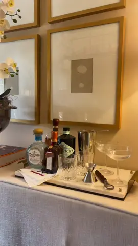 Repurposed this silver punch bowl and moved some things around to have a little bar area in our dining room! So cute and adds something to this console 🤩  #homeaesthetic #interiordesign #designer #styling #homedecor #thriftstyling #fleamarketfinds #DIY #pinterest #aesthetic #art 