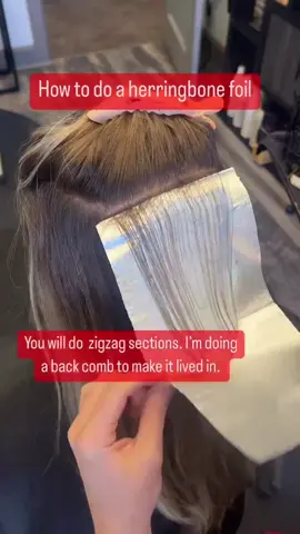 Have you heard of the “Herringbone” technique? Watch til the end to see the full application‼️ Herringbone gives pops and blondes and super customizable. You can use it for grey blending. You can use the same pattern for hand painting and you can use it for Vivids.  The foils I used for this technique are @styletekbeauty  @ruskhaircare ultimate blonde 10vol and then gloss was Xpress 9p+BN . . . . #btconeshot2023_colorvideo #balayage #balayagehighlights #herringbone #haircolor #haircolorist #haircolortutorial #haircoloreducation #blondebalayage #denverhairstylist #denverhairsalon #denverhaircolor @STYLETEK® 