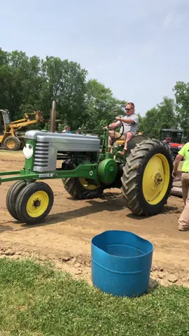 ⚠️Wheelie bars are attached for safety of driver to prevent flipovers. Do not attempt⚠️ weight towards the rear tires is good, but too much will bring your front end up, which lowers your drawbar height. Through trial and error, you will learn the best way to balance your tractors weight to find the happy medium, as they did in this video.  : Also, this club signals out of bounds when just the rear tire hits the grass, so we have lots of room to put some nasty angles on the sled! #tractor #tractorpulling #pulling #wheelie #johndeere #weight #balancing #weightbalancing #antiquetractortok