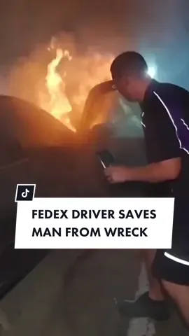 A delivery driver has rescued a man from a burning vehicle just seconds before it exploded. FedEx employee Jonathan Rohrbach was driving down a major U.S. highway when he spotted the burning car, which had crashed into a guard rail, and made the split-second decision to help. 