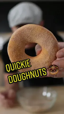 🍩 Quickie Doughnuts 🍩 I have a couple or recipes for Doughnuts. This one I prefer when I just CBF and I'm fiending for a hit of sugar. [Ingredients]  Dough ~ 300g Bread Flour (13% Protein) ~ 6g Milk Powder ~ Chef's Pinch of Salt  ~ 13g White Granulated Sugar ~ 5g Baking Powder ~ 14g Oil  ~ 1 Egg Room Temp ~ 110ml Water (Can replace with milk, just omit milk powder too) Sugar ~ 100g Caster Sugar ~ 6g Cinnamon  ~ Pinch of Cardamom  ~ Pinch of Salt Extras ~ 1.75L Frying Oil Oil Temp ~ 160°C  #Doughnuts #easydoughnuts #donut #tastelessbaker #aussie 