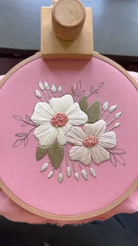 I made this monochromatic floral hoop and love these thread colors together! They really pop against the pink fabric. It’s available now!  #e#embroidery#fiberartist#handembroidery#beginnerembroidery#crafts#handstitched#embroideryart#embroidertok#processvideo