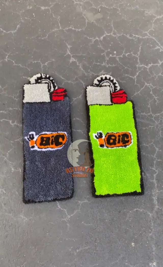 Rugs currently available. Measurements & prices listed in caption. Shipping fee $10 or if local we can meet up! 🧶⭐️ Blue lighter 22in. x 8in. $40 Green  lighter 21in. x 8.5in.  Drake 18in x 18in $80 Hello Kitty w phone 2ft x 16in. $75 Hello Kitty head 18in. x 18in. $75 #customrugs #rugsforsale #lighterrug #drakerug #hellokittyrugs #hellokittyart #astrozostudios 