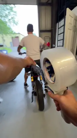 Working on my Uline sponsorship.  . #tapechallenge #packingtape #packingtapechallenge #tapeprank #funnyvideos #bikeshop #ebike #electricbike #shophumor #dumbvideos #tapetrend #packingtapetrend #electricbike #fail #failarmy #sparkcycleworks #ev #rideelectric #prank #prankwars #uline 