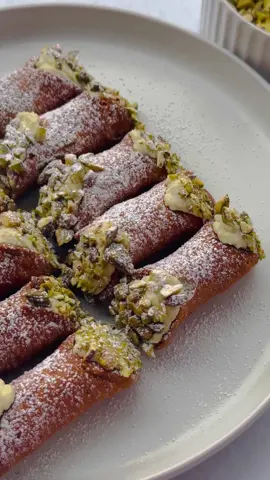 Pistachio Cannoli  Growing up, my Mum made the BEST custard Cannoli. Only up until my recent trip to Europe did I try traditional Ricotta Cannoli and I WAS IN LOVE! So here is my recreation, with a beautiful Nutty Pistachio touch 🤗 With Cannoli, the filling is the star of the dish, so it is recommended to use good quality Ricotta. @lacasadelformaggio Ricotta is always my go to and never disappoints.  💌 Save this recipe for your next get together, or for you and your special someone!  Pistachio Filling: * 500g @lacasadelformaggio Ricotta, drained  * 1/2 cup Icing Sugar * 1 Tsp Vanilla Extract * 1 Tbsp Thickened Cream * 1 Tbsp Pistachio Creme * Pre Made Cannoli Shells   * Pistachios, roughly chopped * Caster Sugar for dusting  Method: 1. Add all Pistachio filling ingredients listed above in a stand mixture and mix until all ingredients have combined.  2. As you can see in the video, I started to combine the ingredients with a whisk, but for a more smooth consistency, using a stand mixture is much more beneficial.  3. Transfer the pistachio filling in a piping bag, and pipe each cannoli shell until full on each end. I like to use a swivel motion in order to fill any air pockets and ensure the centre of each cannoli is full and not hollow.  4. Dip each end of the cannoli’s in the chopped pistachios, dust with icing sugar and enjoy!  Cannoli is best served fresh, so the shell contains it’s crispy crunch 🤗 #cannoli #dessert #cheese #italiancooking #recipeshare #Recipe #collab #lacasadelformaggio 