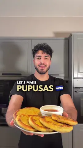 Pupusas | Recipe⬇️  Ingredients: For the masa dough: * 2 cups masa harina (corn flour for tortillas) * 1 1/4 cups warm water * 1/2 teaspoon salt For the filling: * Vegan cheese (grated) * Cooked seasoned black beans (or refried beans) * Chopped sautéed vegetables (bell peppers, onions, zucchini, etc.) Instructions: * Prepare the Masa Dough:  * In a large bowl, combine the masa harina and salt.  * Gradually pour in the warm water while mixing with your hands. Knead until the dough becomes smooth and slightly moist. Adjust water or masa harina as needed.  * Cover the dough with a damp cloth and let it rest for 15-20 minutes. This allows the masa to hydrate and become more pliable. * Form the Pupusas:  * Take a small handful of dough and roll it into a ball about the size of a golf ball.  * Flatten the dough ball slightly and use your thumb to create an indentation in the center.  * Place a spoonful of your chosen filling (vegan cheese, beans, sautéed vegetables) into the indentation.  * Carefully fold the edges of the dough over the filling, sealing it to create a stuffed ball.  * Gently flatten and pat the ball into a round disc, approximately 1/2 inch thick. * 	Cook the Pupusas:  * Preheat a non-stick skillet or griddle over medium heat.  * Place the pupusas onto the hot surface and cook for about 4-5 minutes on each side. You're looking for a golden brown color and a crispy texture. * 	Serve:  * Transfer the cooked pupusas to a plate. You can serve them immediately while they're warm.  * Accompany with optional sauces or sides, such as tomato sauce or salsa. #pupus #pupusas #pupusassalvadoreñas #pupusasforyou #pupusassalvadoreñas🇸🇻 #pupusaslocas #veganpupusas #stuffedflatbread  #veganmeal #veggierecipes #veganerezepte #asianfood #vegan #veggie #veganrecipes #pancake #pupusas #placinta #veganessen #veganes #vegetarianrecipe #veganmealprep #plantbasedfood #veganlunch #veganfood #veganrecipe #pupusa #veganfoodie #veganfoodporn #veganlunch #vegetarianrecipes #flatbread #vegancomfortfood #vegetarian #veganeernährung #stuffedbread #easyveganmeals #vegandinner