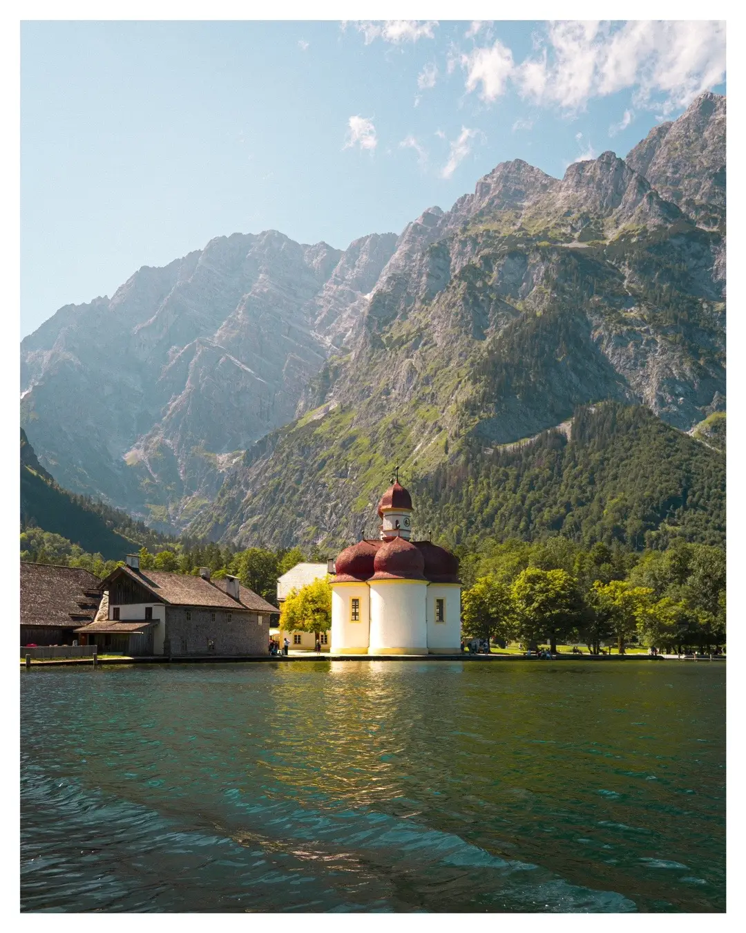 Postcards from Königssee ⛵️ How about a ferry ride across Germany’s deepest (and cleanest!) lake?  Lake Königssee is located in Berchtesgaden National Park near the German-Austrian border, in one of the most picturesque areas in the country. This crystal clear alpine lake is said to be the cleanest in Germany because since 1909 only pedal, rowing or electric boats have been allowed on it.  You can take a ferry across the lake from Schönau am Königssee to Obersee (which is the most amazing hiking area!) and if you fancy a stop, you can get off halfway at the beautiful St Bartholomew Church for some lunch and obligatory glass of German beer 🍺 #königssee #bavaria #visitgermany #berchtesgaden #germanytourism #germanytravel 