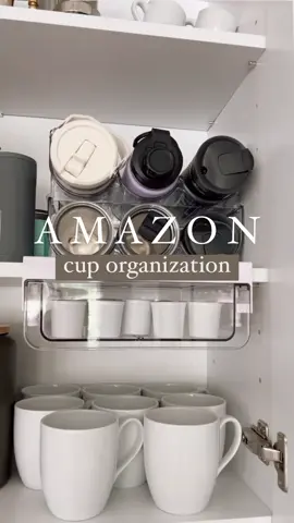 Three Amazon finds to help organize your cup cabinet🙌🏼 We all have that one cabinet that's so hard to keep organized. The cup holders and under cabinet drawer are all linked in my bio 🔗🤍#amazonkitchenfinds #cabinetorganization #cabinetorganizing #getorganized 