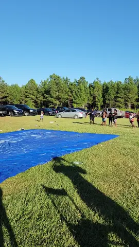 Father and Son race 😂😂😂 #843mudlife #fyp #viral #slipandslide #waterslide #race #fatherandson #family #bbq #backyard #funny #espn #olympics 