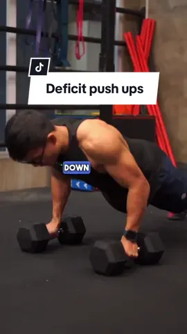 Dumbbell push ups  Deficit push-ups with dumbbells involve elevating your hands on the dumbbells, creating a deeper range of motion.  Start in a push-up position with each hand on a dumbbell. Lower your chest as far as you can, feeling a stretch in your chest and shoulders.  Push back up to the starting position.  This exercise intensifies the push-up by engaging more chest and shoulder muscles, enhancing strength and muscle development. #chestworkout #chest #dumbbellchest #biggerchest #bodybuilding 