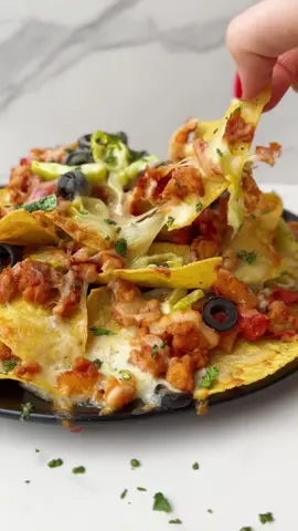 A mountain of italian style nachos #footballfood #nachos #italianfood #funappetizers 