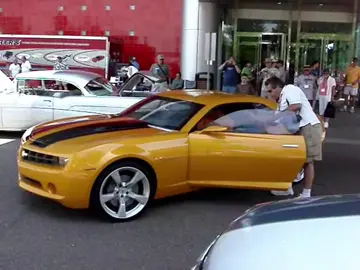 This is the bumblebee concept Camaro from Transformers 2007. This car was built for GM by SSV, and it was based on a Pontiac GTO chassis and colored in sunrise yellow. This car went back to Micheal Bay sometime in late 2007/early 2008 and the design team added some modifications to make it into the revenge of fallen Camaro. It is not known if the concept Camaro or the bumblebee concept Camaro from the first movie even exist anymore. This is rare footage btw  #avilexi #transformers #bumblebee #camaro #bumblebeecamaro 