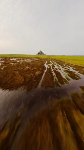 Flying towards Mont Saint-Michel 🏰 Mont Saint-Michel is such a dreamy and beautiful place! I couldn't believe my eyes as we approached it with by car. We went to visit it from the inside but honestly, it's so much more impressive from the distance. There's a lot of places to see it from far and enjoy the view on it and the places around. 10/10 Location in France 🇫🇷 & i absolutely enjoyed this trip to Normandy. #france #normandy #saintmichel #fpv #gopro #travel