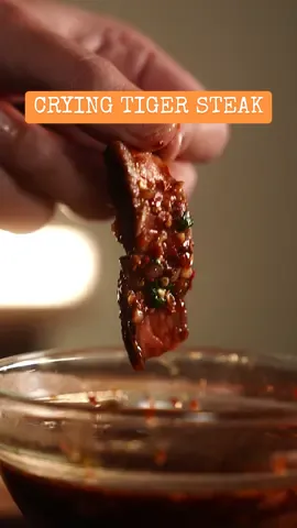 Have you heard of this?! 🥩 After my first bite of Crying Tiger Steak, I can confidently say it is one of my favorites. And the best part is it's easy to make especially when using @Schwank Grills  Recipe: 🔶  For Steaks: 🔷 2 tbsp oyster sauce 🔷  2 tbsp fish sauce 🔷  2 tsp palm sugar or brown sugar 🔷  2 ribeye steaks (or any other steak cut you prefer) 🔶For Sauce: 🔷  2 tsp raw sushi rice 🔷  1 tbsp tamarind paste 🔷  3 tbsp fish sauce 🔷  1 tbsp lime juice 🔷  1 tbsp brown sugar 🔷  1 tbsp chilli flakes 🔷  1 small red shallot 🔷  2 tsp  chopped cilantro #Schwankgrills #steak #grilling #Recipe #EasyRecipe #carnivore #fyp 