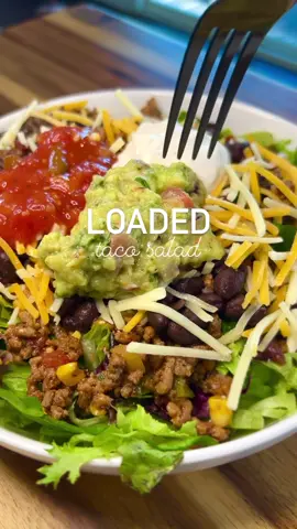 Loaded Taco Salad 🌮🥗 with romaine lettuce, spring mix lettuce, ground beef, sweet corn, black beans, shredded cheese, pico de gallo, zesty sour cream, guacamole, and Hot Honey Apple Salsa #thecastironchef #Foodie #food #foodporn #healthy #salad #saladrecipe #tacos #tacosalad #healthyfood #vegetables #blackowned #target #targetstyle #targetfinds #ncchef #privatechef 