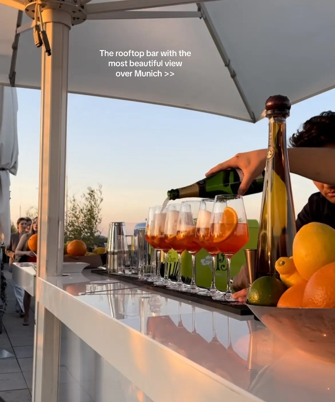 Especially at sunset 🌅🥂✨                                          #munich #munichbar #munichrooftop #münchen #munichweeknd 