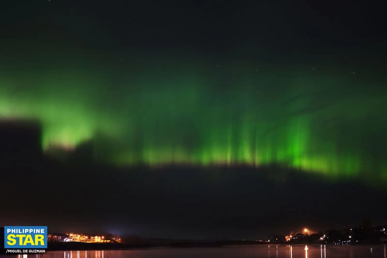 The Northern Lights, also known as “Aurora Borealis,” burst in vibrant colors over houses as seen from Chestermere City in Alberta, Canada around 1AM on Saturday, October 21, 2023. (Photos by Miguel de Guzman/The Philippine STAR) #auroraborealis #northernlights #newsph #SocialNewsPH #canada #albertacanada 