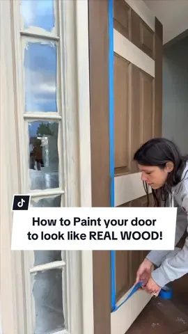Faux Painted Door?! Heck yes!!!! Here are a few tips!  👇 - TAPE, TAPE, TAPE Tape off each section.  TRUST me - this step is what makes the door really really look like wood. - TAPE the corners. I know it’s a little time consuming but do you want a door that looks like wood for around $50?? Ok - then tape those angles in the panels. - Quickly dry between coats using a blow dryer. Product LlNKS in my @mazon SH0P #fauxwood #fauxwooddoor #fauxpainting #frontdoormakeover #doormakeover 
