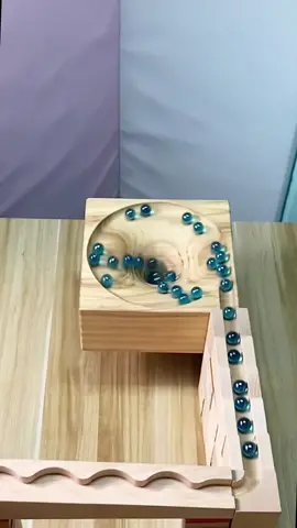 Colorful, relaxing marbles are extremely fun.  #woodentoys #trackball #marbles #satisfyingvideo #relaxmind #enjoy 