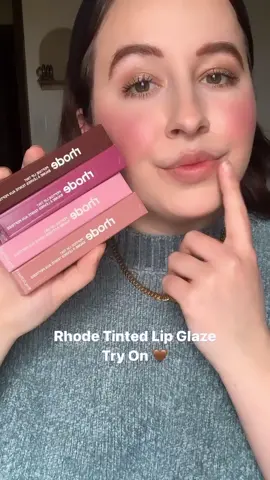 🎀Rhode Lip Tints Try On🎀 I have been using these for a bit and wanted to share my thoughts! I like that these are unscented (they do have a faint vanilla taste though). They are quite thick and cushy (a little more thick than the summer fridays balms). I love the shade range of these! My fave is definitely Ribbon!  Shades: 🎀Ribbon 🥞Toast 🍇Raspberry Jelly ☕️Espresso ✨which shade has your eye? Let me know down below!!  #rhode #rhodepeptideliptreatment #haileybieber #lipswatch #lipproducts #lipbalm #haul #makeup #beauty #explore #foryoupage #trending #discover #aesthetic #thatgirl #newmakeup #viralmakeup #quietmoments 