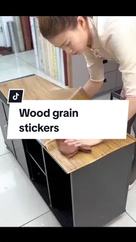 The furniture is old and shabby. Stick this wood grain sticker to refresh it.#wallpaper #woodensticks #DIY #fyp 