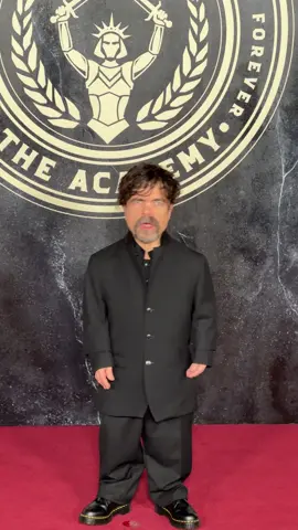 at the premiere of #thehungergames, #peterdinklage hits the red carpet 