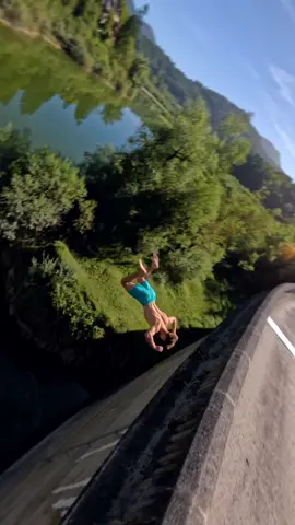 Into dark water 🥹 Thanks Simon for jumping 4 times until I got the shot 😂 Have you seen the other version where I fly straight into the bridge? #austria #fpv #drone #nature #outdoor #drohne #natur #reisen #cliffjump #doublebackflip #brücke 