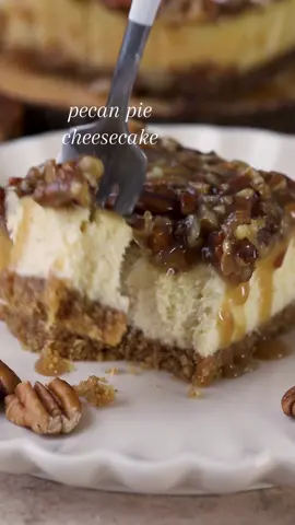 Pecan Pie Cheesecake Bars are delicious, with a buttery graham pecan crust, creamy cheesecake, and pecan pie topping! #pecanpie #cheesecake #cheesecakebars 