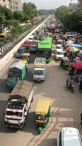 Looking down from an overpass at a highway filled with total madness; scary but mesmerising. And this is the story of India today, rapdily rising like a wild fire.  #India #indiantraffic #delhi #traveltiktok 