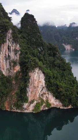 ~ Cheow Lan Lake ~ Surat Thani, Thailand . . . . . Khao Sok National Park in Southern Thailand is an amazing place. It is covered by the oldest evergreen rainforest in the world, huge limestone mountains shooting straight up in the air, deep valleys, breathtaking lakes, exciting caves, wild animals and much more. . . . . . #thailand #khaosok #forest #jungle #khaosoknationalpark #suratthani #mood #foggy #lake #drones #naturelover #cheowlanlake #thailandvibes #thailandismagic 