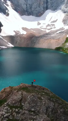 Unveiling the mesmerizing landscapes of #Kyrgyzstan   🇰🇬 Kyrgyzstan's pristine mountain lakes, like this one, are formed by glaciers, creating the purest and most beautiful waters you can imagine.🤩 🎥: @tynchtykmr 🏞️  #wanderlust  #naturelover  #glacierlake  #bluelake  #mountainlake