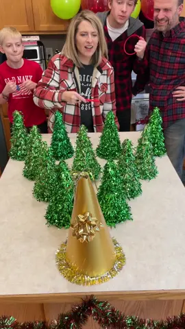 Christmas Tree Ring Toss Game 🎄 Dad, mom, kids, and family play counter top Christmas tree ring toss game for fun prizes. Toss a ring on the golden tree, win a special prize. This video was produced by Benson Family, Network Media, and Benson Bros. (for entertainment purposes only) See less