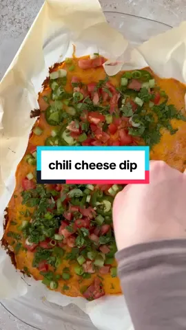Chili Cheese Dip — filling, flavorful, and comes together in just 30 minutes. Made with straightforward ingredients and baked in the oven, it’s a great option for serving at parties and events. #realbalancedblog #chilicheesedip #cheesedip #easyappetizer #30minuteappetizer
