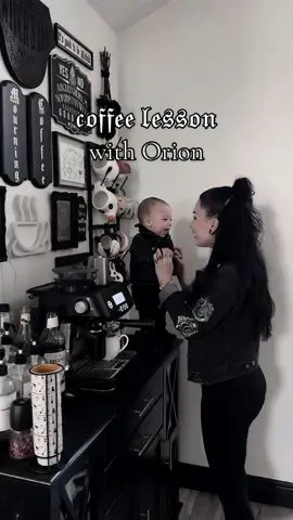 baby barista in training ☕️ 🖤 #GrowingOurCoven #CoffeeCoven #Latte #OOTD #SpookyMom #HomeDecor #GothBaby #Halloween #CoffeeBar #Aesthetic  #barista #Vlog #CoffeeTok #GothInterior #Alt 