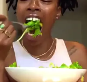 girl does looney toon poses while pretending to enjoy salad