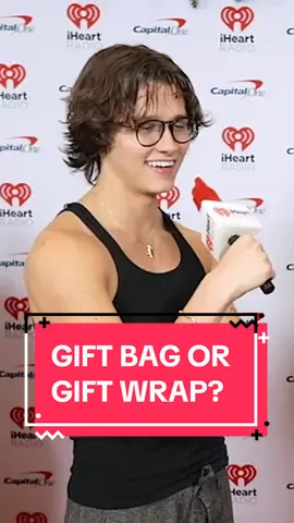 Are you team Gift bag 🛍️ or Gift wrap 🎁? Comment the emoji and let us know!  We got the important answers on the #iheartjingleball #redcarpet 😅 @Myles Galloway  #giftwrapping #giftbag #holidays #gifts #iheartradio #jingleball #nyc 