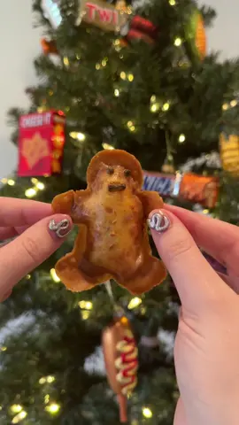 I made crab Rangoon gingerbread men! I don’t know if I should call these cursed or cute.. I’ll let you all be the judge of it 🥹 This was the most fun I’ve had cooking in a long time.  I started out by steaming Dungeness crabs in sprite. Then I picked out the meat and mixed it with melted salted butter. I love the taste of butter with crab and thought it would go well with the Rangoons. I then mixed in whipped cream cheese, garlic, sesame oil, and Calabrian chilies. I used a gingerbread man cookie cutter to cut into spring roll wrappers- I have found when doing stuff like this the spring roll wrapper will keep the shape better than eggroll wrappers, but that’s just my personal opinion. I added egg wash then piped in the crab Rangoon filling. Are there in a sealed the two pieces of spring roll wrappers together and I used more egg wash to add on the eyes, the mouth and the buttons. I first used sesame seeds has eyes, but then I felt a little bit more confident and used white pepper corns. As you can imagine, I was really nervous to Fridays, but at the same time I was really pleasantly surprised that everything held together even the eyes and mouth !! This is definitely one of the more fun recipes I have done lately 🥹 #crabrangoon #gingerbreadman #holidayrecipes 