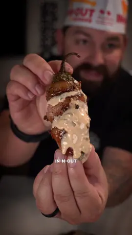 In & Out Jalapeño Popper Recipe ⤵️⤵️⤵️ Sauté Onions until Caramelized Then finely dice Pickles  In a pan add Gourmet Burger Patties   Cook until Medium Rare then add: Caramelized Onions Chopped Pickles & American Cheese  Cook until 🧀 is melted  Then Hallow out Jalapeños  & add the Animal Style mixture in the Boat Wrap with Bacon Add SPG seasoning  In the Smoker or Oven at 375 degrees  This took about 1 hours but it is done when the Bacon is nice and crispy! 🥓  In & Out Spread Sauce:  1/2 cup Mayonnaise  1/4 cup Ketchup  2 Tbsp Mustard 1/8 cup Relish Pinch of Salt & Pepper  1 Tbsp Sugar We used @Meatdistrict OG Burger patties that have a blend of Chuck, Brisket, and Short Rib! These honestly are my favorite blend! 🍔 #inandout #animalstyle #jalapenopoppers #Recipe    