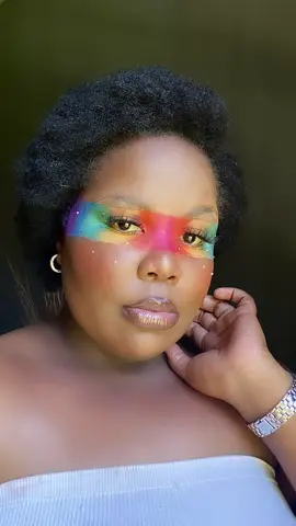 here’s a rainbow look tutorial inspired by @BeatsByDeb 🌈✨. #rainbowmakeuplook #pigmentmakeup #blackgirlmakeup #makeuptrend #creativemakeup #makeuptrend #rainbowmakeup #makeuphack #tapemakeup