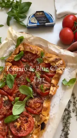 Tomato & Blue Cheese Tart 🍅 🧀 Ingredients: 150g Creamy Blue Cheese or any cheese 2 brown onions, thinly sliced  2 tbsp olive oil  3 tbsp chopped thyme leaves  Salt, pepper  2 30cm squares shortcrust pastry  6 vine ripened tomatoes  Handful basil leaves  2 tbsp balsamic glaze  Method   Preheat an oven to 220C.  Unwrap the blue cheese & pull or cut into lots of small pieces.  Place the onions, olive oil, half the thyme and a little salt, pepper into a medium saucepan & place over a medium high heat.  Cook for 5 minutes, stirring until they begin to soften then cover, turn the heat to a medium and cook, stirring often, for 7-8 minutes until they just begin to caramelise but are still light in colour. Remove to a plate and cool.  Cut the tops and bottoms off each tomato and slice each one into three thick slices. Lay them on a tray with paper towel, covering with more paper towel & let sit for 15 minutes to dry them out. Lay the sheets of pastry onto a sheet of baking paper, slightly overlapping each other in the centre to create a rectangle gently press them together at the join.  Spread the onions over the pastry leaving a 3-4 cm boarder then scatter over half the blue cheese. Lay the tomatoes sliced over the onions, just slightly overlapping, in rows of 3 slices all the way down the tart.  Fold the pastry up and over the edges of the tomatoes, crimping as you go. Brush the edges of the pastry with the egg scatter the remaining thyme leaves over the tomatoes with the remaining blue cheese.  Bake this for 40-50 minutes, until the pastry is crisp and tomatoes nice and roasted. Serve cut into wedges, scattered with basil leaves and drizzled with the balsamic glaze.  #Castello #castellocheese #cheese #EasyRecipes #FeedYourSenses #christmasdinner #EasyRecipe #christmasrecipe 